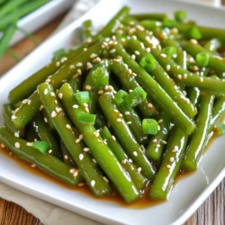 - 1 pound fresh green beans, trimmed - 3 tablespoons honey - 3 cloves garlic, minced - 2 tablespoons soy sauce - 1 tablespoon sesame oil - 1 tablespoon olive oil - Salt and pepper to taste - 1 tablespoon sesame seeds (for garnish) - 2 green onions, sliced (for garnish) When measuring honey, use a liquid measuring cup. This helps you pour it easily. For the garlic, use fresh cloves for the best taste. If you don't have a scale, one pound of green beans is about 4 cups. For the soy sauce, use low-sodium if you want less salt. You can switch honey with maple syrup for a vegan option. If you don't have green beans, try snap peas or asparagus. Instead of sesame oil, use peanut oil for a different flavor. You can also use garlic powder if fresh garlic is not on hand. {{ingredient_image_1}} Start with one pound of fresh green beans. Trim off the ends to clean them up. Bring a pot of salted water to a boil. Add the green beans and cook for 3 to 4 minutes. You want them bright green and tender-crisp. Drain the beans and quickly move them to a bowl of ice water. This helps stop the cooking and keeps them crunchy. In a small bowl, combine 3 tablespoons of honey, 3 minced garlic cloves, 2 tablespoons of soy sauce, and 1 tablespoon of sesame oil. Whisk these together until they blend well. This sauce gives the green beans a sweet and savory taste. The garlic adds a nice kick, making it even better. Heat 1 tablespoon of olive oil in a large skillet over medium heat. Once the oil is hot, add the blanched green beans. Sauté them for about 2 to 3 minutes. You just want to heat them through. Next, pour the honey garlic sauce over the beans. Toss them well so the sauce coats every bean. Continue cooking for another 2 to 3 minutes. This helps the sauce thicken slightly and glaze the beans. Remove the skillet from heat. Season the green beans with salt and pepper to taste. Transfer them to a serving platter. Top with sesame seeds and sliced green onions for a nice touch. Enjoy your delicious honey garlic green beans! Cooking the green beans just right is key. Start with blanching them for 3-4 minutes. This keeps them bright green and a bit crunchy. If you overcook them, they become mushy. After blanching, quickly place them in ice water. This stops the cooking and keeps their color. I recommend using a large skillet for sautéing. Heat olive oil over medium heat before adding the blanched beans. This helps them heat evenly. Stir them gently for 2-3 minutes. Then, add the honey garlic sauce. Make sure to coat the beans well. This gives each bite a burst of flavor. To boost the taste, consider adding a splash of lime juice. This adds a nice tartness. You can also toss in some crushed red pepper for heat. If you want a bit more crunch, add chopped nuts like almonds or cashews. These small tweaks can make your dish even more exciting. Pro Tips Blanching is Key: Make sure to plunge the green beans into ice water immediately after boiling to preserve their bright color and crisp texture. Adjust the Sweetness: Feel free to modify the amount of honey according to your taste preference; add more for a sweeter glaze or less for a savory touch. Use Fresh Garlic: Freshly minced garlic adds a stronger flavor compared to pre-minced versions; it enhances the dish's aroma and taste. Garnishing Matters: Don't skip the sesame seeds and green onions; they add a wonderful crunch and visual appeal to the finished dish. {{image_2}} You can easily make honey garlic green beans vegan. Replace honey with maple syrup or agave. These options add sweetness without using animal products. The rest of the recipe stays the same. This way, everyone can enjoy this yummy dish. Want to boost your meal? Add protein to your green beans. You can toss in cooked chicken, shrimp, or tofu. Simply cook the protein separately, then mix it with the green beans and sauce. This makes a balanced dish full of flavor and nutrients. Feel free to change the flavors! Instead of soy sauce, try coconut aminos for a gluten-free twist. Add red pepper flakes for some heat. You can also include fresh herbs like basil or cilantro for a fresh taste. These simple changes keep your dish exciting every time you make it. After cooking, let the honey garlic green beans cool. Place them in an airtight container. Store in the fridge for up to three days. This keeps them fresh and tasty. If you want to enjoy them later, make sure to seal the container well. You can freeze honey garlic green beans, but they may lose some crunch. First, blanch the green beans for two minutes. Then, cool them in ice water. Drain and spread them on a baking sheet. Freeze them for about an hour. Once frozen, transfer to a freezer bag. They can last up to three months in the freezer. To reheat, you have a few options. You can use the microwave for a quick fix. Place the green beans in a bowl and cover them. Heat in short bursts until warm. For a better texture, try the skillet. Heat the skillet over medium heat and add the green beans. Toss them until they are heated through. This method helps the glaze shine again. Yes, you can use frozen green beans for this recipe. They save time and are easy to use. Just make sure to thaw them first. You can even blanch them in hot water for a few minutes. This helps keep their bright color and crunch. Frozen beans may cook faster, so watch them closely while sautéing. To make honey garlic green beans healthier, try these tips: - Use less honey to cut down on sugar. - Swap soy sauce for low-sodium soy sauce to reduce salt. - Add more veggies like carrots or bell peppers for extra nutrients. - You can also use olive oil instead of sesame oil if you prefer. Honey garlic green beans pair well with many dishes. Here are some tasty options: - Serve them alongside grilled chicken or fish for protein. - They also go great with rice or quinoa for a complete meal. - Try them with stir-fried tofu for a plant-based option. - You can even mix them into a salad for added crunch. We explored the ingredients and steps for making honey garlic green beans. You learned how to prep green beans and make a delicious sauce. I shared tips for perfect cooking times and different variations. Use the ingredient substitutes if needed and follow our storage tips for freshness. Enjoy experimenting with flavors and serving ideas to make this dish your own.